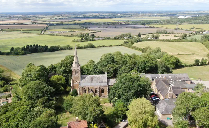 Aerial view of Barrowby church and the Vale of Belvoir