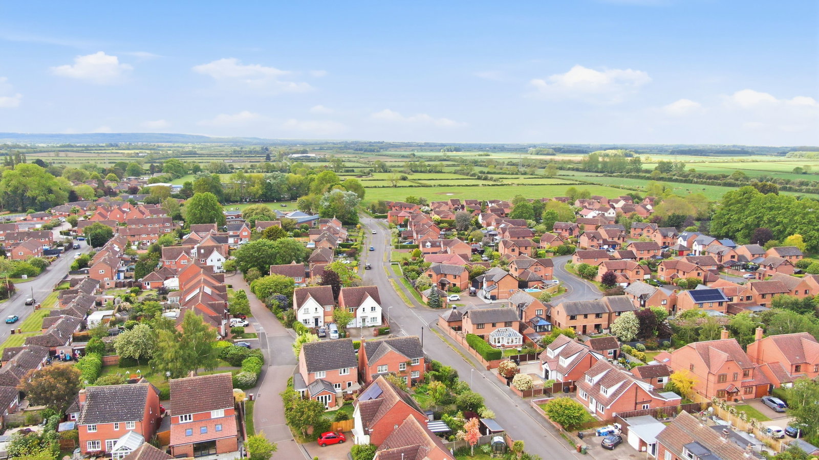 Drone aerial view over Bottesford village and the Vale of Belvoir